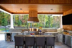 Design of a summer kitchen in the house