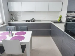 White Kitchen With Gray Countertop Photo