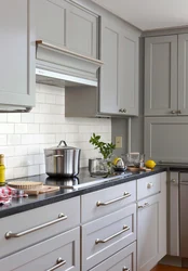 White kitchen with gray countertop photo