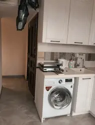 Small kitchen layout with washing machine photo
