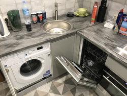 Small kitchen layout with washing machine photo