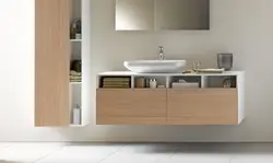 Hanging cabinets in the bathroom with a sink photo