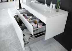 Hanging cabinets in the bathroom with a sink photo