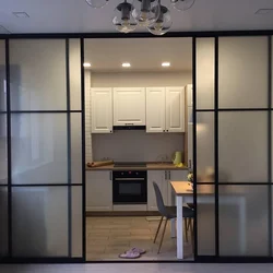 Interior with sliding doors kitchen with living room