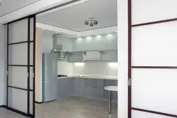 Interior with sliding doors kitchen with living room