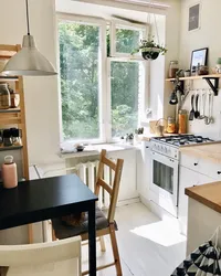 Small kitchen design with window and doors