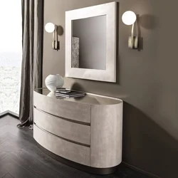 Chest of drawers with mirror in bedroom interior photo
