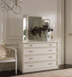 Chest Of Drawers With Mirror In Bedroom Interior Photo