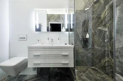 Bathroom design with marble tile shower