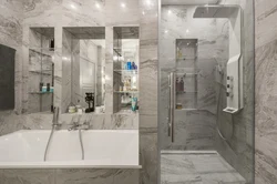 Мәрмәр плиткалары бар ванна бөлмесінің дизайны