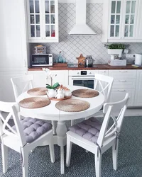 Photo interior of a small kitchen with a round table