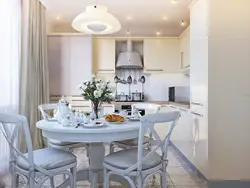 Photo Interior Of A Small Kitchen With A Round Table