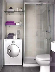 Bathroom With Shower Cabin Design In Apartment And Washing Machine