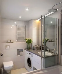Bathroom with shower cabin design in apartment and washing machine
