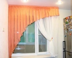 One curtain in the kitchen photo
