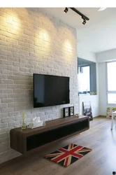 Living room design with brick on one wall