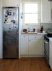Refrigerator in the corner of the kitchen photo in the interior