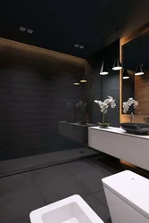 Bath design in black with wood