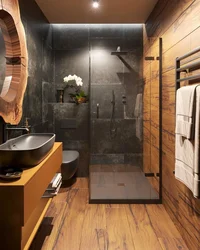 Bath design in black with wood