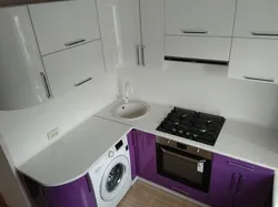 Small kitchen design with refrigerator and washing machine and gas