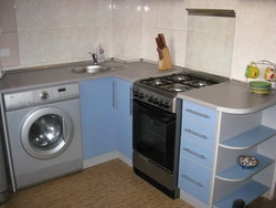 Small kitchen design with refrigerator and washing machine and gas