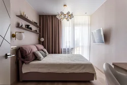 Rectangular Bedroom Interior With One Window Photo