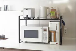 How to hang a microwave in the kitchen under the cabinets photo