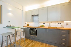 Photo of kitchen interior on one wall