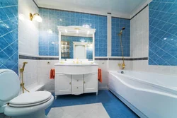 What color goes with blue in the bathroom interior