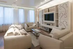 Living Room Interior In An Apartment In Light Colors And Corner Sofas