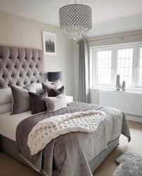 Bedroom interior with gray bed