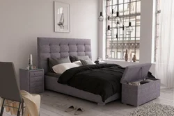Bedroom interior with gray bed