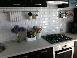 Tiles Behind Slabs In The Kitchen Photo