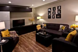 Wallpaper in the interior of the living room with dark furniture photo