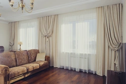 Modern curtain design for the living room with two windows and a wall