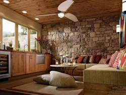 Living room with stone and wood photo