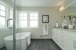 White bathroom with gray floor design