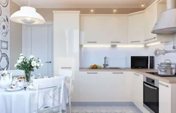 Design of a small kitchen in an apartment in light colors