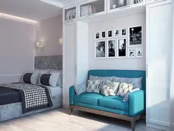 Photo of living room interior with bed and sofa