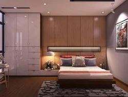 Bedroom with wardrobe at the head of the bed design