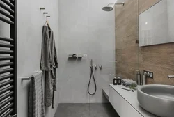Bathtub with shower design in gray tones