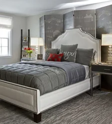 Bedroom Design With A Gray Bed With A Soft Headboard