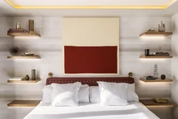 Shelves above the bed in the bedroom interior