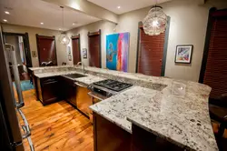 Countertop for the kitchen in the interior photo which is better