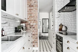 Interior white kitchen and brick