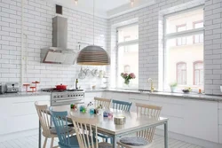 Interior white kitchen and brick