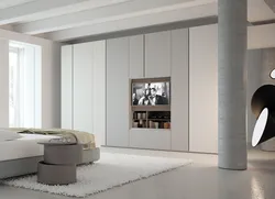 Living room interior with a full-wall closet