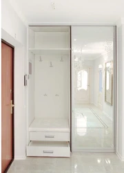 Modern wardrobe for a narrow hallway photo