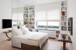 Bedroom design with furniture by the window
