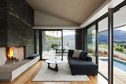 Living room design with panoramic windows in the house